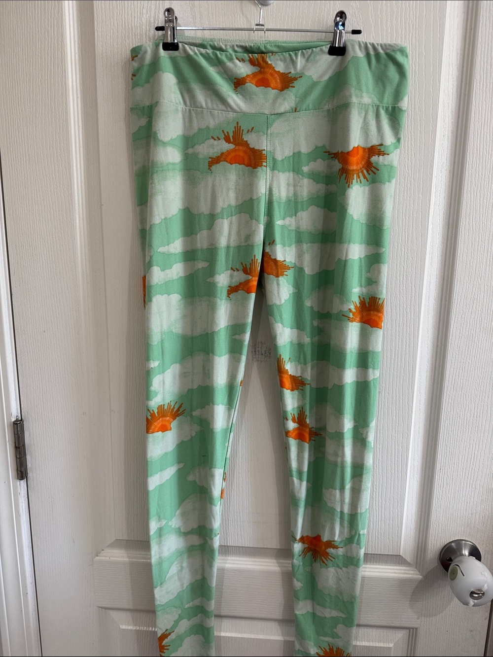 LuLaRoe Mint Green Leggings with Orange Sunburst Print